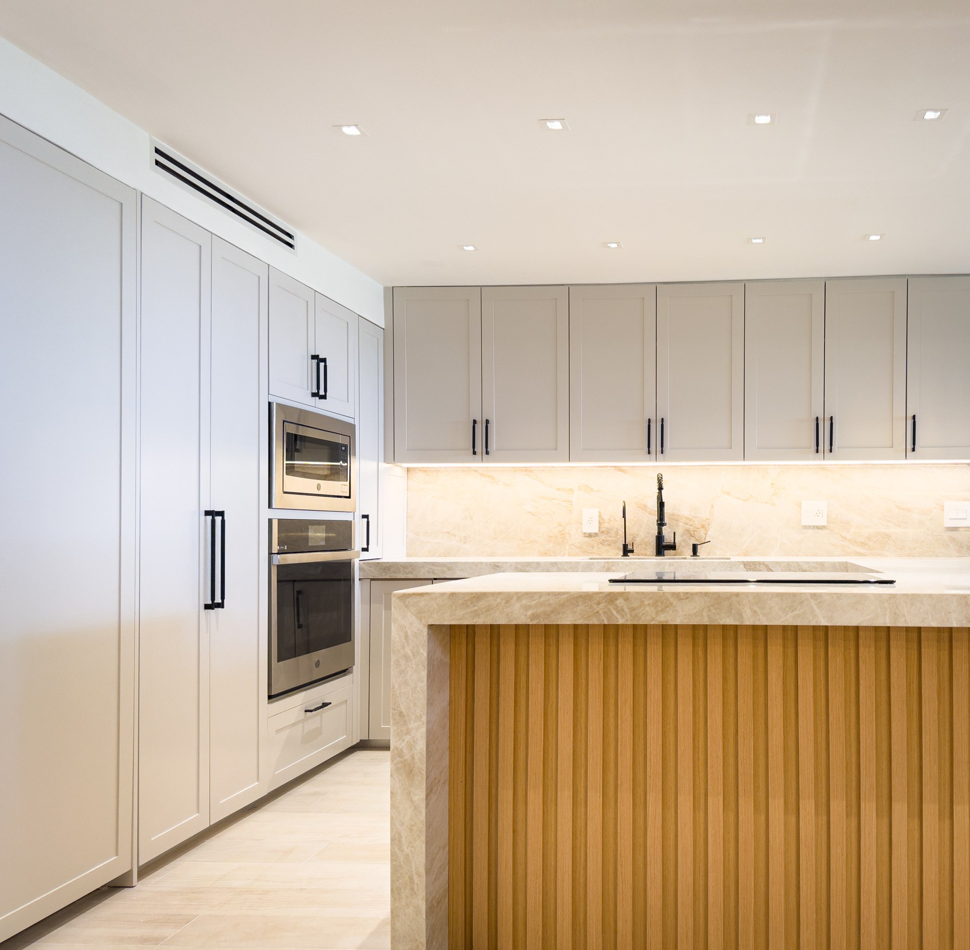 Kitchen and island at Grove Isle Apartment