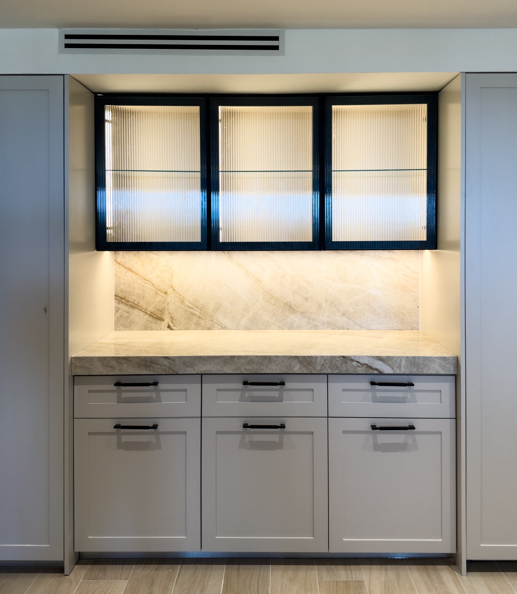Built-in cabinetry at Grove Isle Apartment